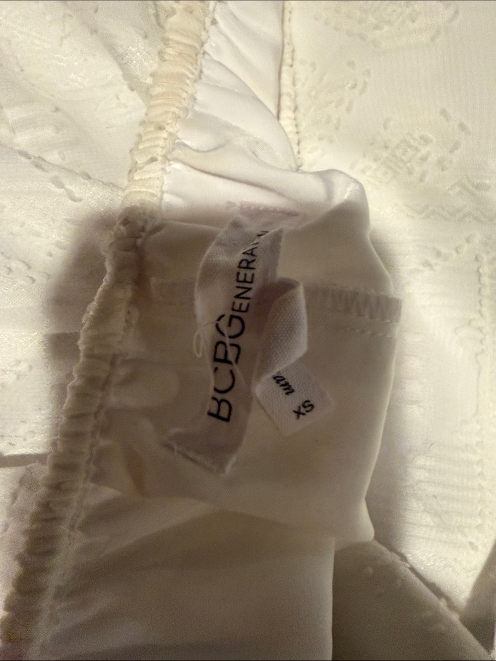BCBGeneration White Off-Shoulder Ruffle Tunic - Picture 2 of 3